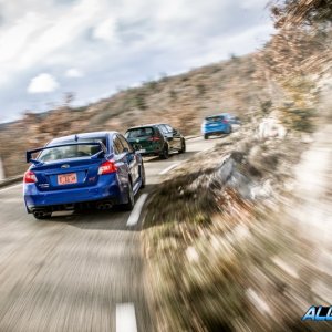 2016-Ford-Focus-RS-2015-Subaru-WRX-STI-and-2016-Volkswagen-Golf-R-202-876x535.jpg